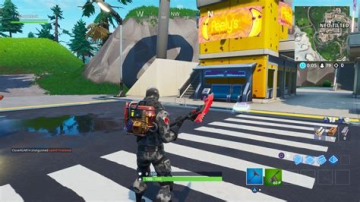 
Fortnite Fortbyte #51 – Accessible by Using the Cluck Strut to Cross the Road In Front of Peely’s Banana Stand